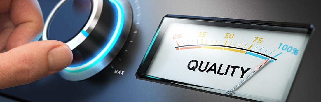a hand turning a dial next to a gauge labeled “Quality” showing the needle pointing at 100%